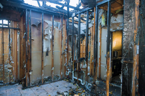 Professional Emergency Fire Damage Restoration technician working in Beldenville, WI